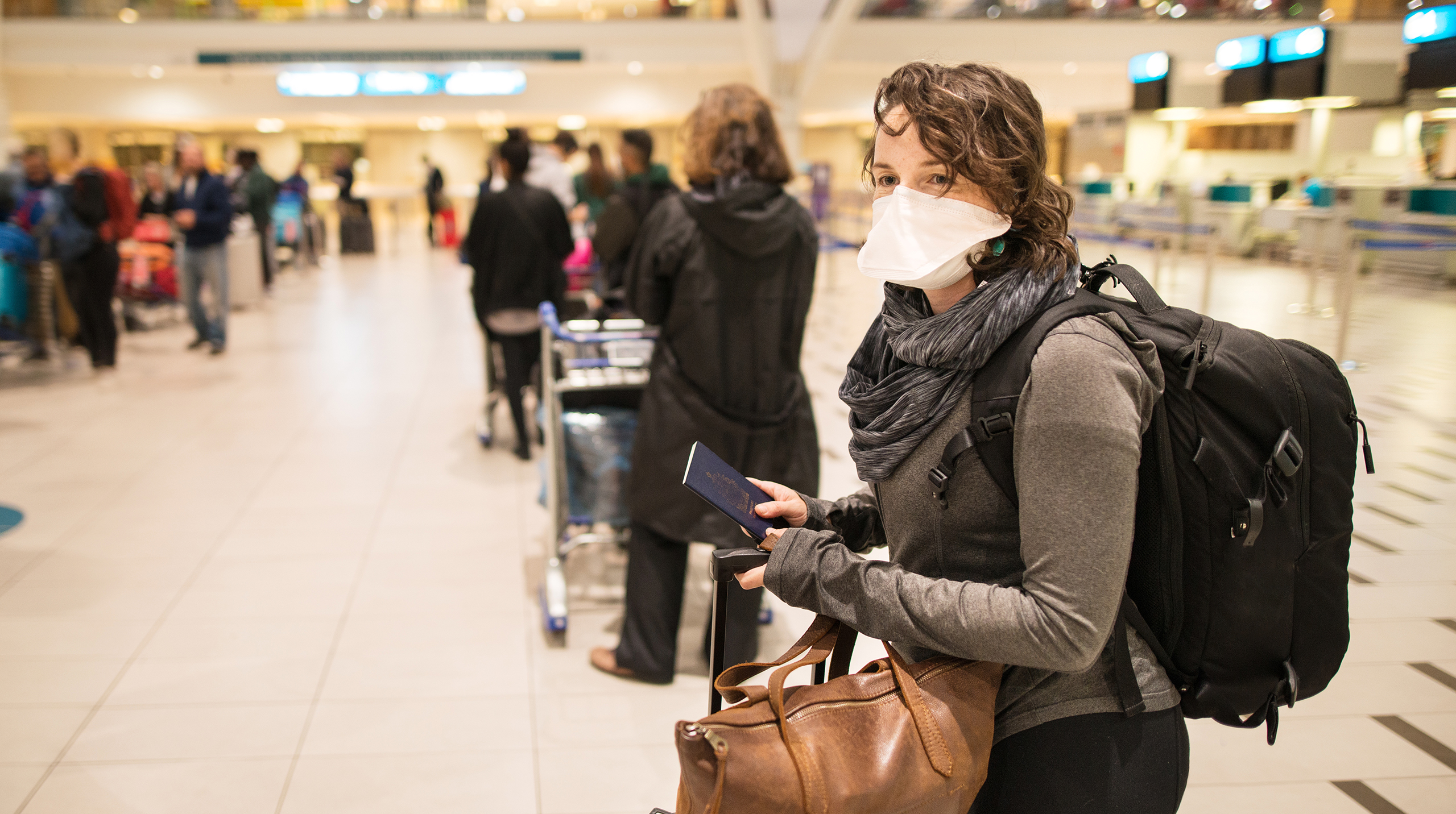 WomanMaskAirport