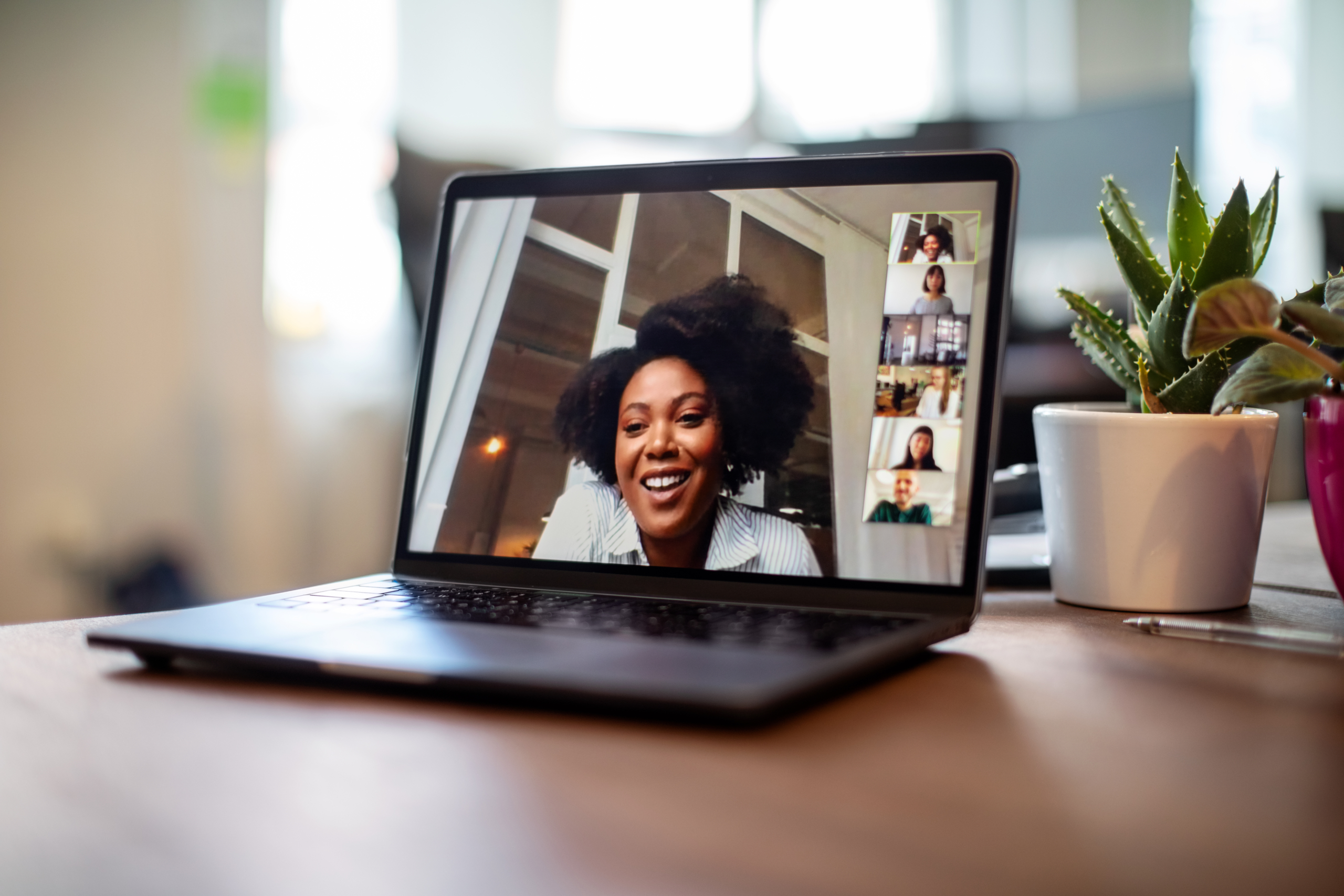 Businesswoman having a video call meeting with her team Computer Keyboard With Red Cookies Key