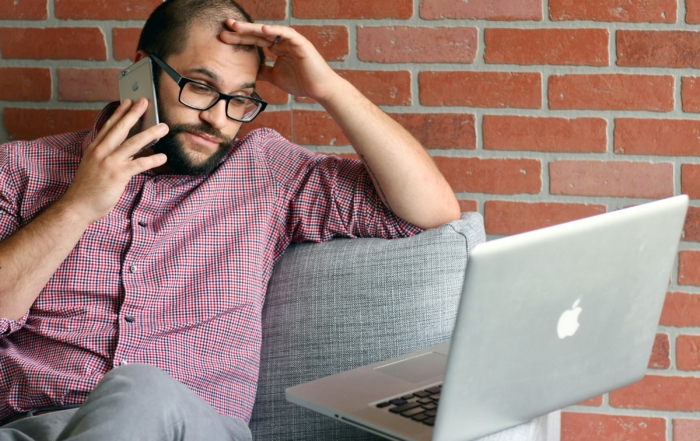 person looking confused using a computer